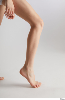 Novel  1 calf flexing nude side view 0004.jpg